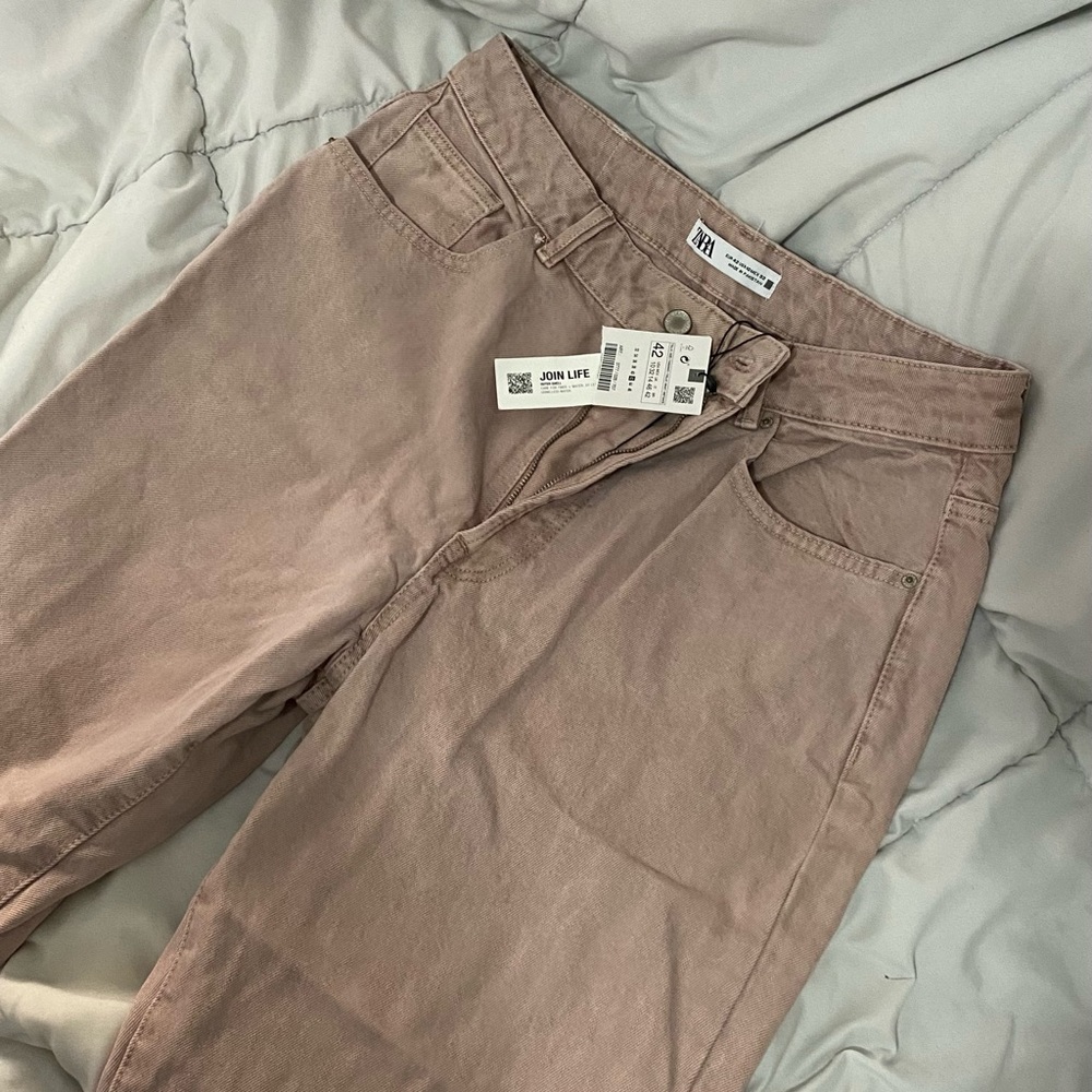 Muted pink denim mom jeans